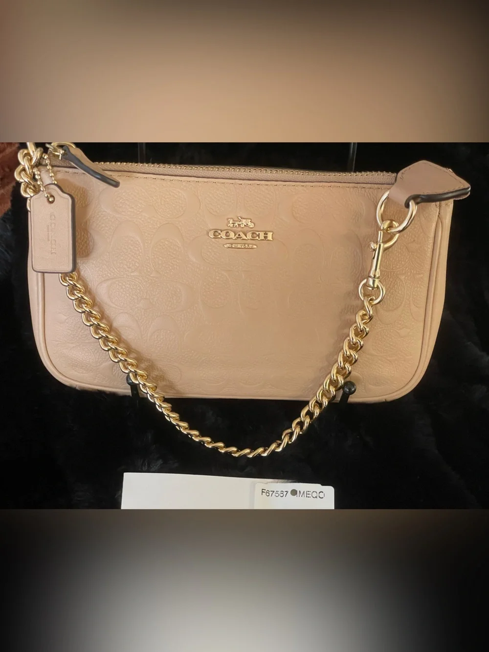 COACH Ivory Embossed Signature C Pebble Leather Large Wristlet F67567